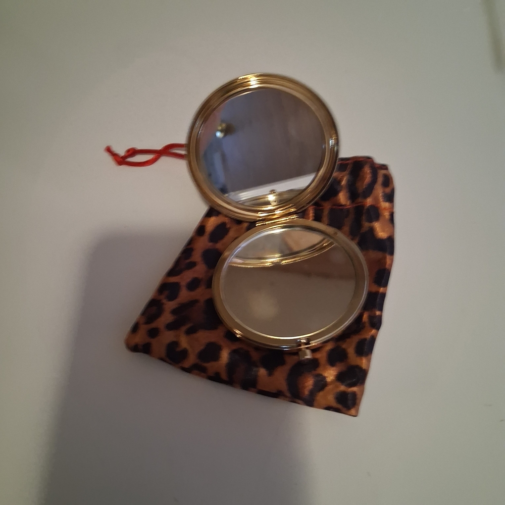 Elegant Black and Gold Clutch with Bow Accent